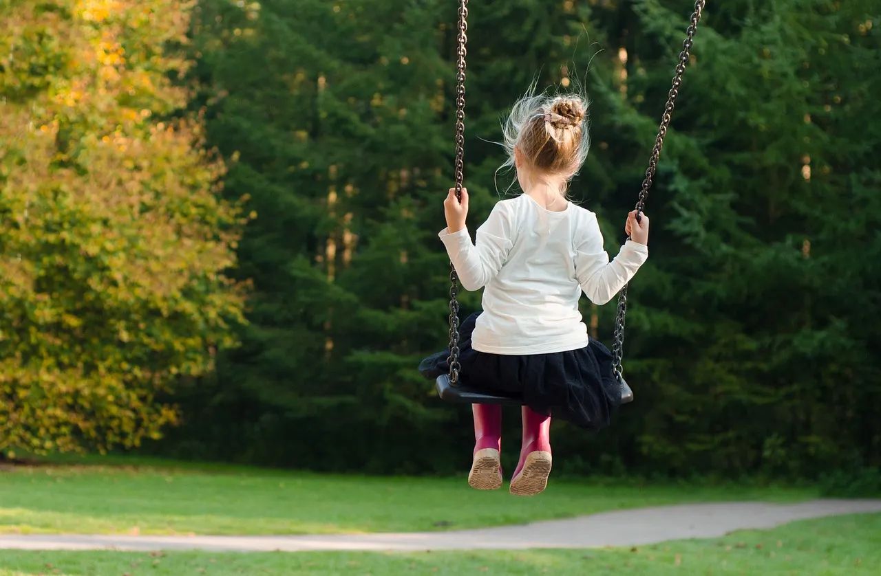 Girl on swing